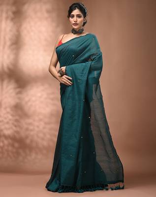 Elegant teal cotton saree with sequin embellishments and pom pom 3