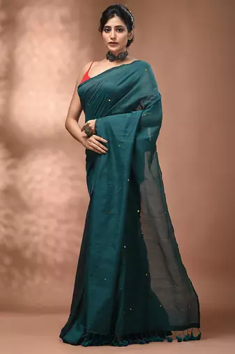 Elegant teal cotton saree with sequin embellishments and pom pom