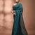Elegant teal cotton saree with sequin embellishments and pom pom