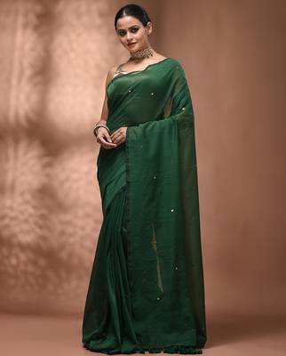 Elegant green cotton saree with sequin embellishments and pom pom 1