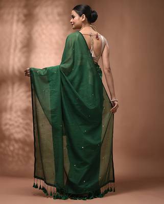 Elegant green cotton saree with sequin embellishments and pom pom 2