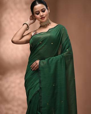 Elegant green cotton saree with sequin embellishments and pom pom 5