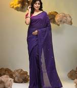Elegant purple cotton saree with sequin embellishments and pom pom