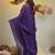 Elegant purple cotton saree with sequin embellishments and pom pom