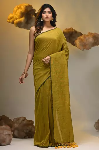 Elegant corn yellow cotton saree with sequin embellishments and pom pom