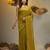 Elegant corn yellow cotton saree with sequin embellishments and pom pom