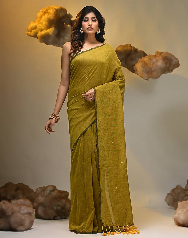 Elegant corn yellow cotton saree with sequin embellishments and pom pom