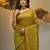 Elegant corn yellow cotton saree with sequin embellishments and pom pom
