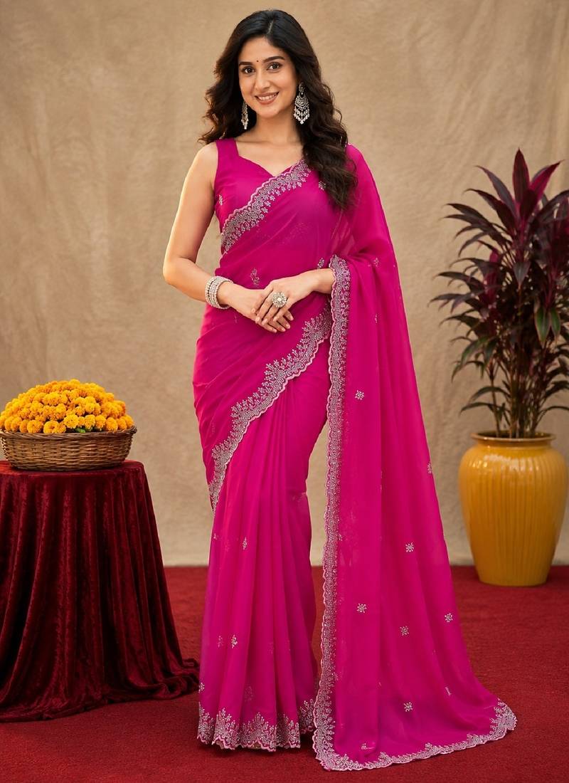 Rani pink soft shimmer chiffon embroidery work saree with unstitched blouse piece