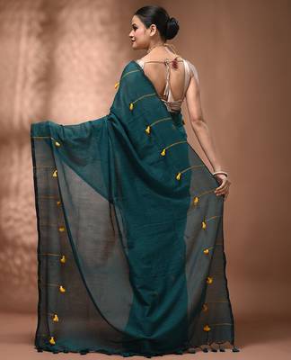 Teal cotton soft saree with pompom 2