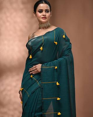 Teal cotton soft saree with pompom 5