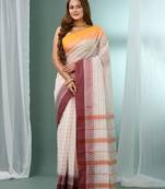 White pure cotton tant saree with woven designs