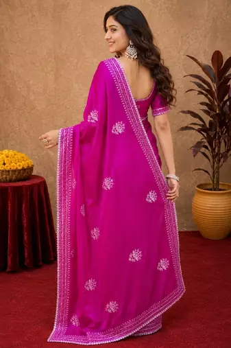 Rani pink soft shimmer chiffon embroidery work saree with unstitched blouse piece