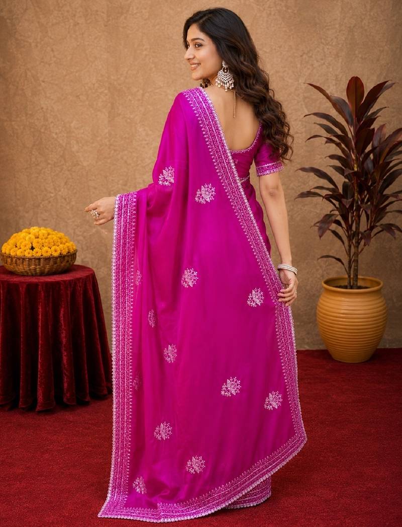 Rani pink soft shimmer chiffon embroidery work saree with unstitched blouse piece
