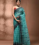 Mint green tant pure cotton saree with charcoal woven border