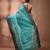 Mint green tant pure cotton saree with charcoal woven border