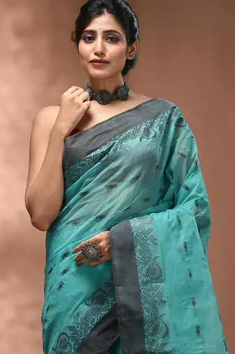 Mint green tant pure cotton saree with charcoal woven border