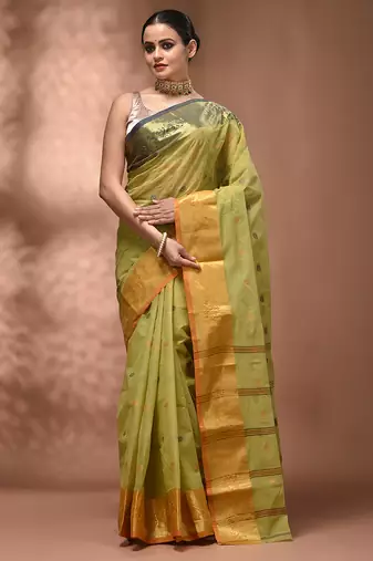 Pastel green tant pure cotton saree with contrasting zari border