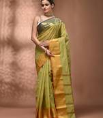 Pastel green tant pure cotton saree with contrasting zari border