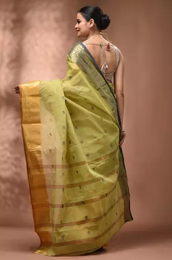Pastel green tant pure cotton saree with contrasting zari border