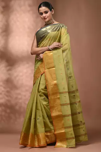 Pastel green tant pure cotton saree with contrasting zari border