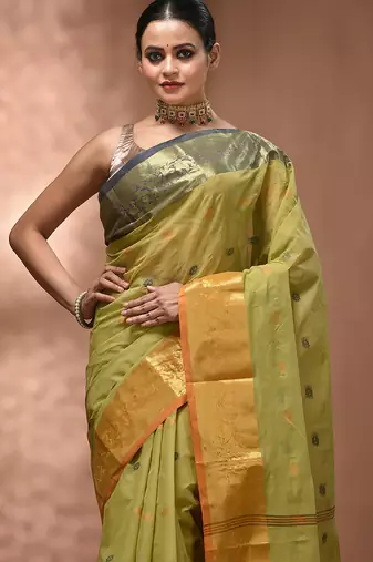 Pastel green tant pure cotton saree with contrasting zari border