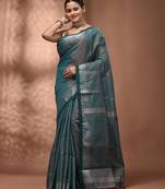 Teal tissue handwoven saree with zari woven temple borders