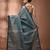 Teal tissue handwoven saree with zari woven temple borders