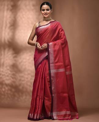 Pink tissue handwoven saree with zari woven temple borders 1