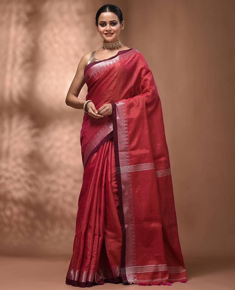 Pink tissue handwoven saree with zari woven temple borders