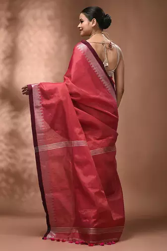 Pink tissue handwoven saree with zari woven temple borders
