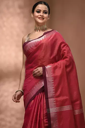 Pink tissue handwoven saree with zari woven temple borders