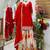 Red designer embroidered silk blend party wear sharara suit and dupatta set