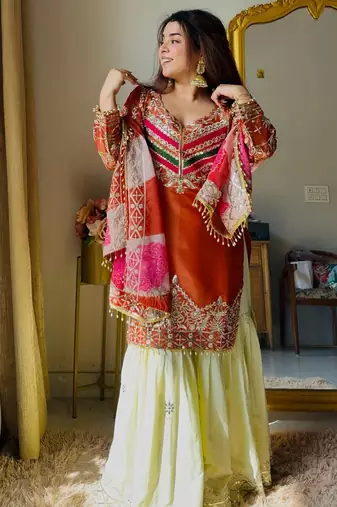 Orange designer embroidered silk blend party wear sharara suit and dupatta set