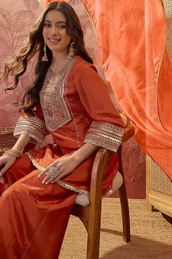 Women's orange crepe embroidered kurta set with dupatta and palazzo