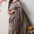 beige cotton blend polka dots print golden zari woven border saree with unstitched blouse piece