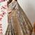 beige cotton blend checks print golden zari woven border saree with unstitched blouse piece