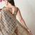beige cotton blend checks print golden zari woven border saree with unstitched blouse piece