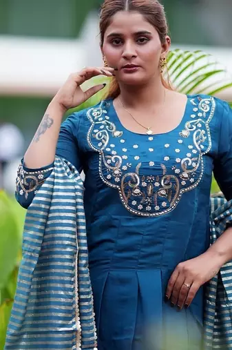 Heavy embroidered peacock blue pleated kurta set with silk dupatta & pant pair