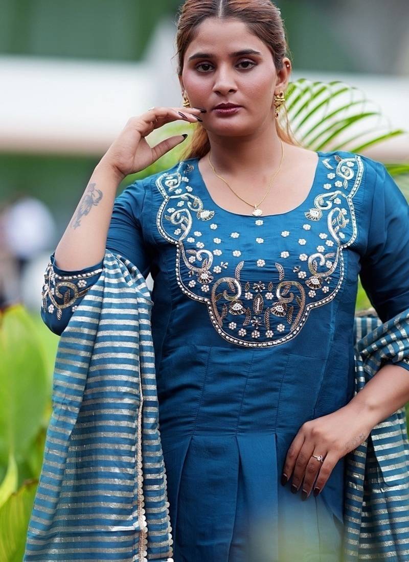 Heavy embroidered peacock blue pleated kurta set with silk dupatta & pant pair