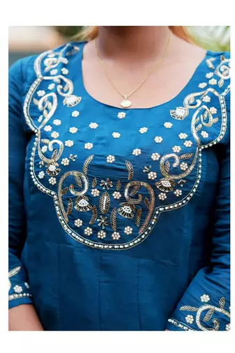 Heavy embroidered peacock blue pleated kurta set with silk dupatta & pant pair