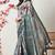 teal cotton blend floral print golden zari woven border saree with unstitched blouse piece