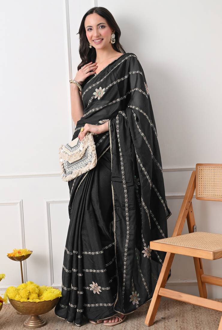 black georgette embellished lace border saree with unstitched blouse piece