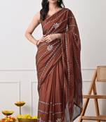 rust georgette embellished lace border saree with unstitched blouse piece