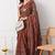 rust georgette embellished lace border saree with unstitched blouse piece