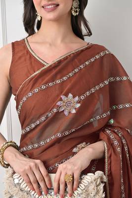 rust georgette embellished lace border saree with unstitched blouse piece 3