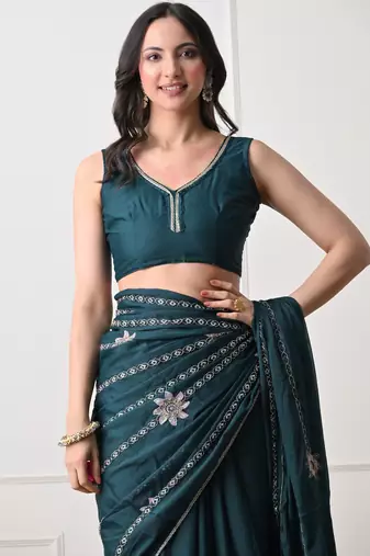 teal georgette embellished lace border saree with unstitched blouse piece
