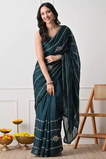teal georgette embellished lace border saree with unstitched blouse piece