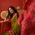 Olive silk cotton printed saree with unstitched blouse piece.