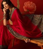 Rani silk cotton printed saree with unstitched blouse piece.
